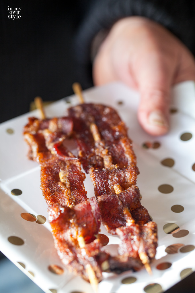 Close up on tow Spicy Bacon Skewers on a festive paper plate