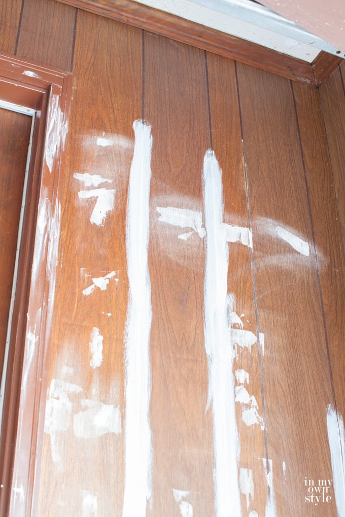 Tutorial showing how to easily paint wood paneling. InMyOwnStyle.com