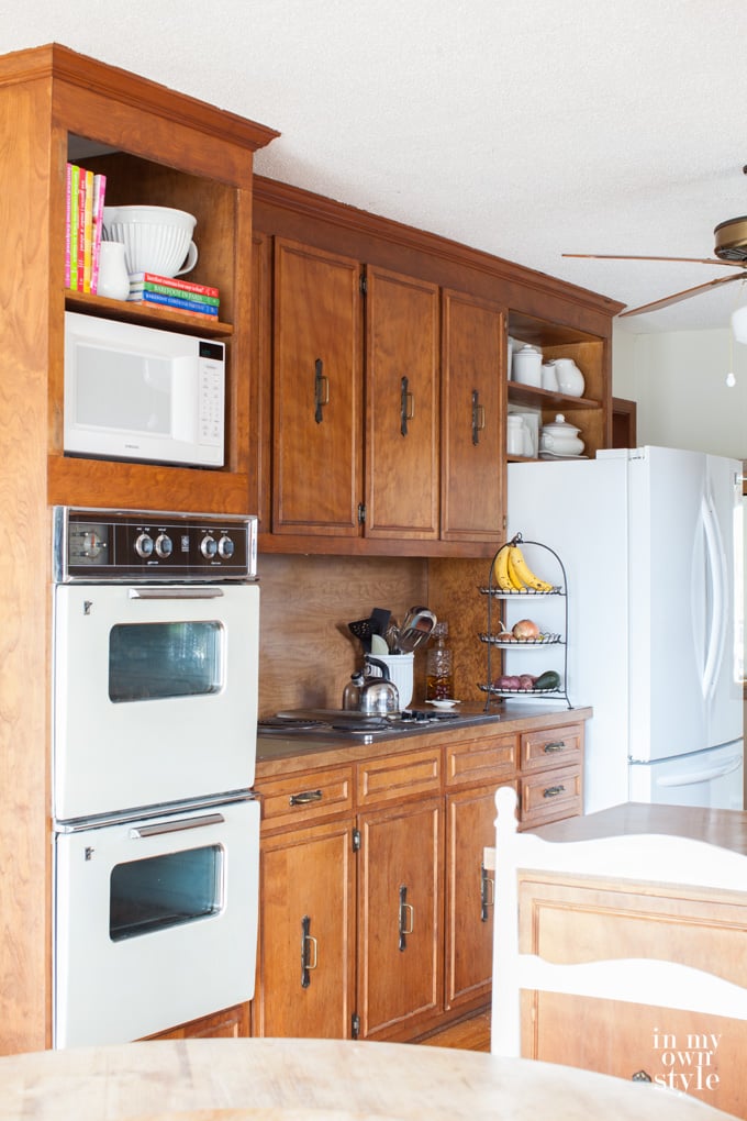 Open kitchen cabinet dishes