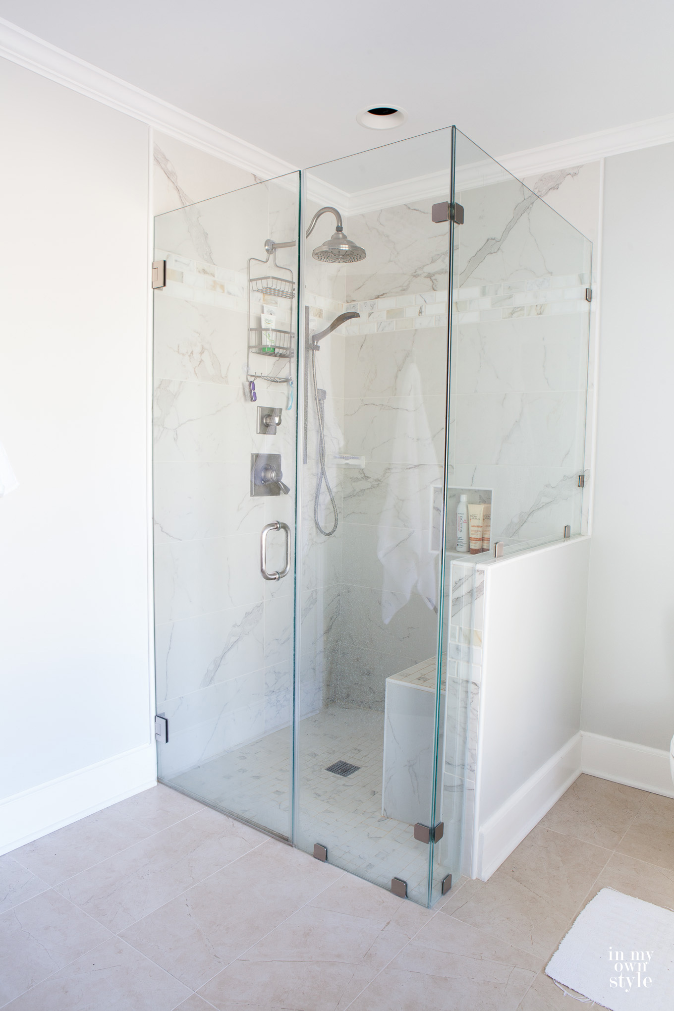 Glass surround shower enclosure