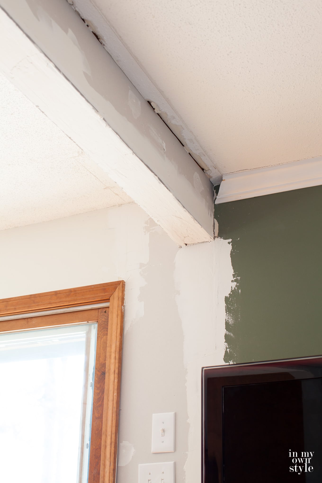 Adding a ceiling beam when removing a wall between two rooms