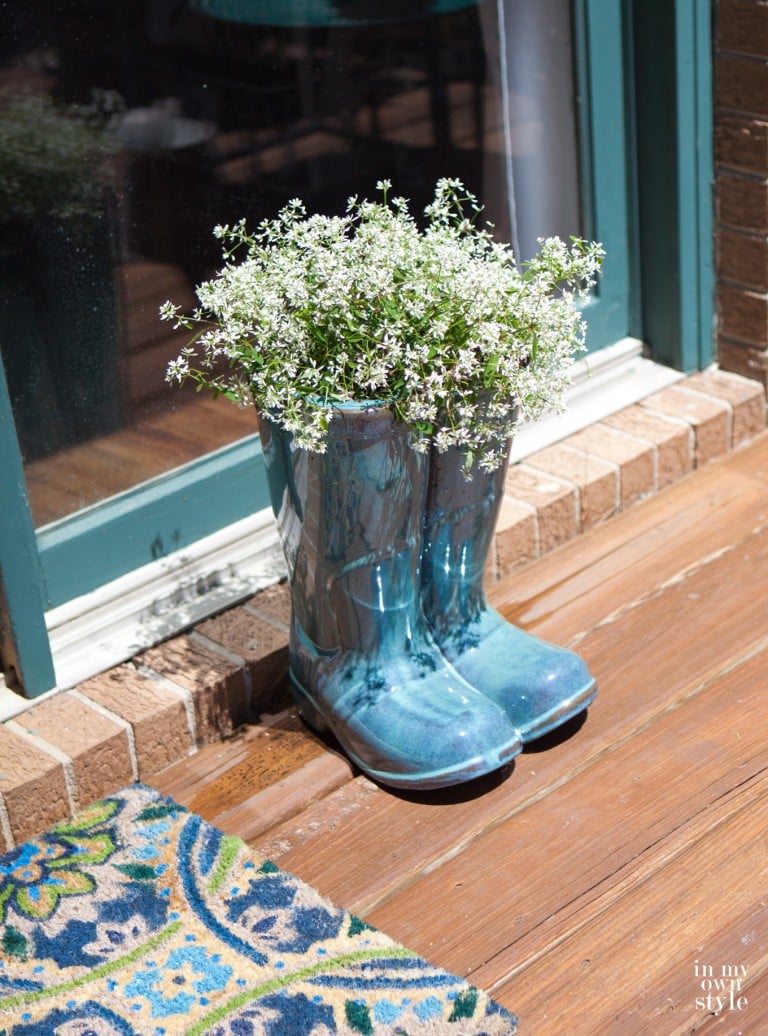 Outdoor flower pot in the shape of boots