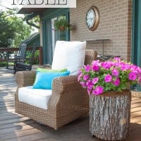Rattan chair and tree trunk side table on deck. Graphic overlay says How to make a tree trunk table.
