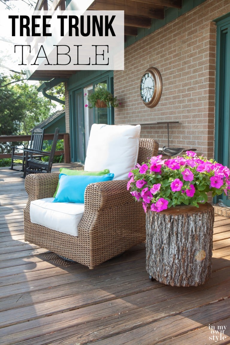 Rattan chair and tree trunk side table on deck. Graphic overlay says How to make a tree trunk table.