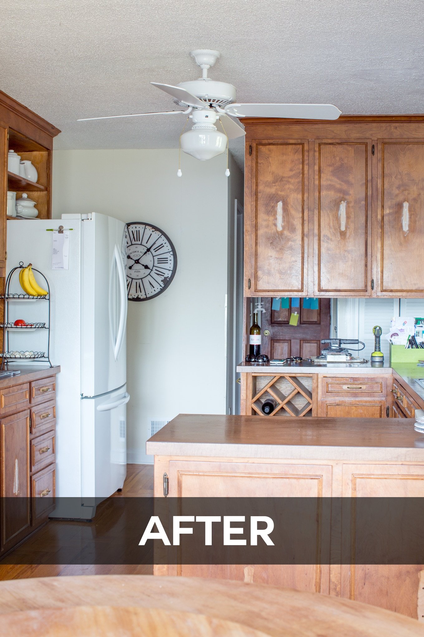 Painted ceiling fan in an outdated kitchen that is getting a makeover