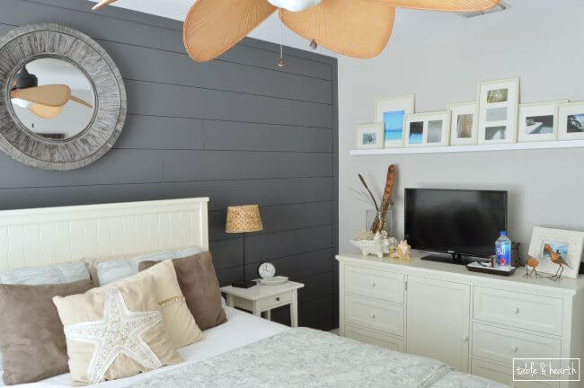 Dark painted shiplap wall