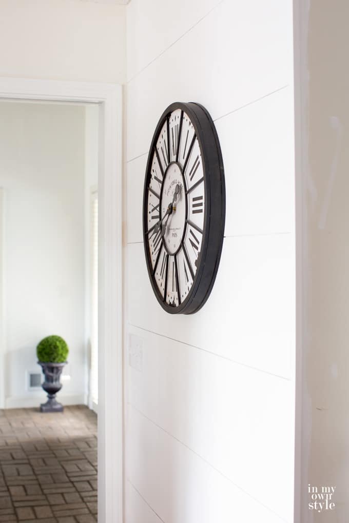 DIY shiplap wood planked accent wall in hallway
