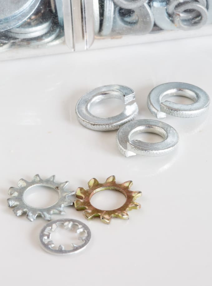 Split and tooth washers needed when tightening cabinet knobs