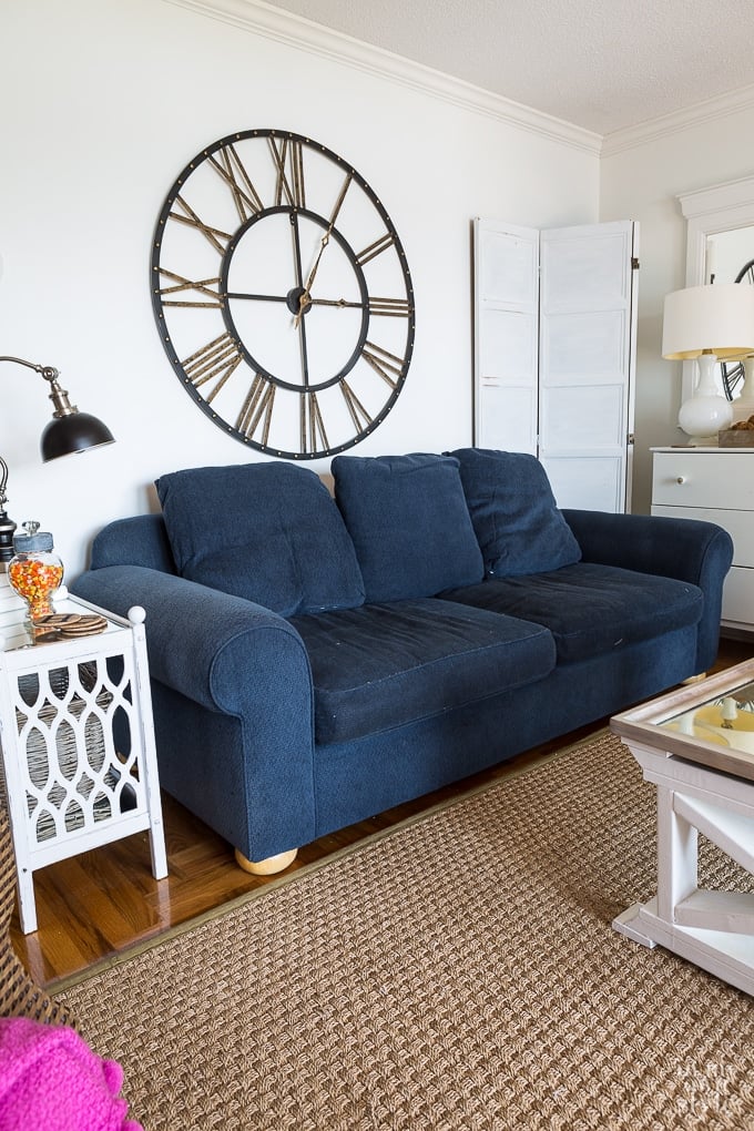 How to cover a sofa with a white throw over or loose fitting slipcover