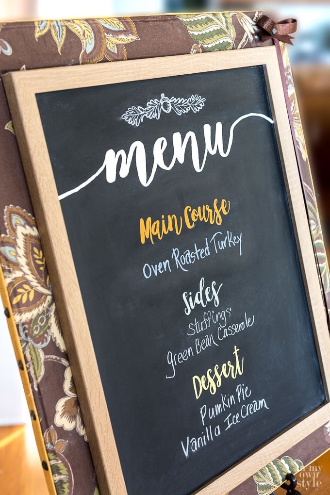 Thanksgiving decorating with fabric projects. Make this fabric covered framed chalkboard for your kitchen or dining room.
