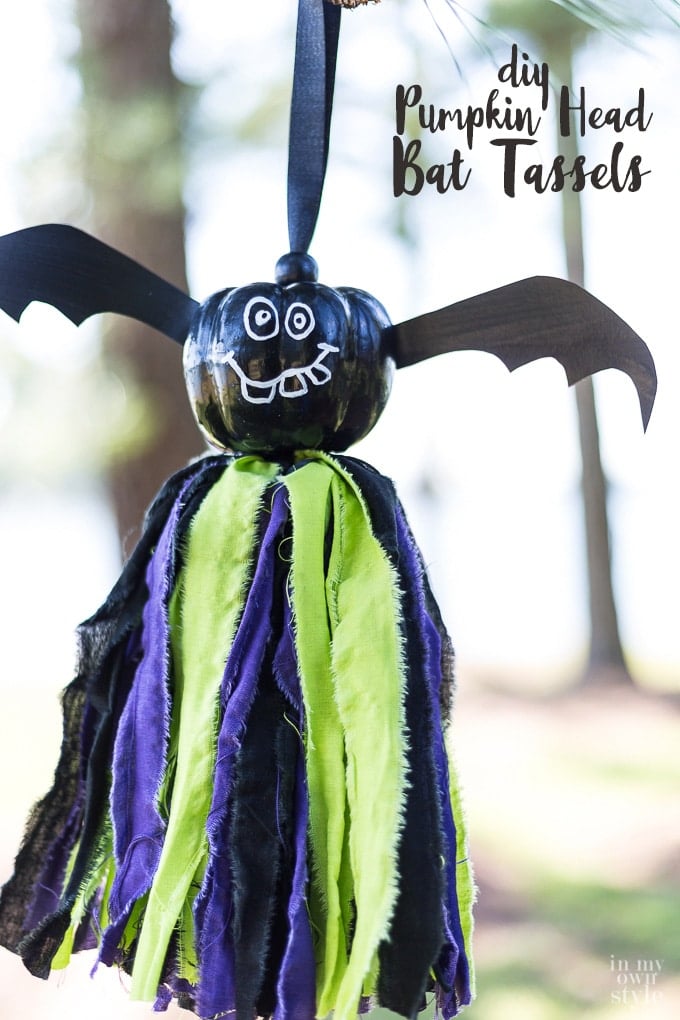 Cute Halloween decorations to make. Pumpkin head bat tassels. No sewing is needed!