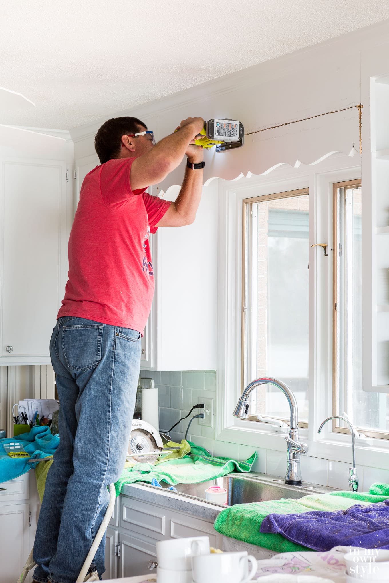 1970's kitchen makeover - how to remove a dated scalloped wood valance over a kitchen sink