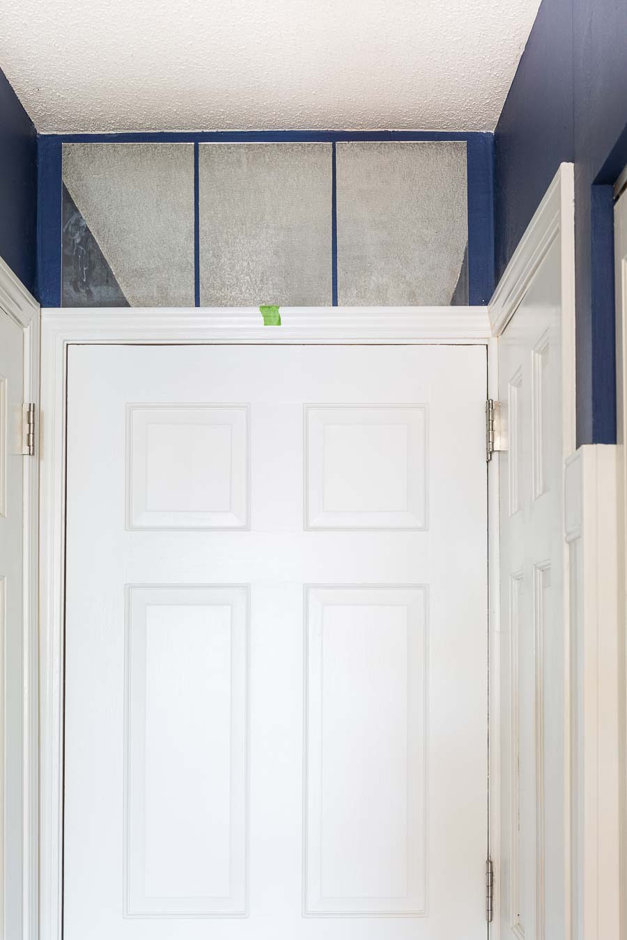 How to create a fake transom above a door using mirrors