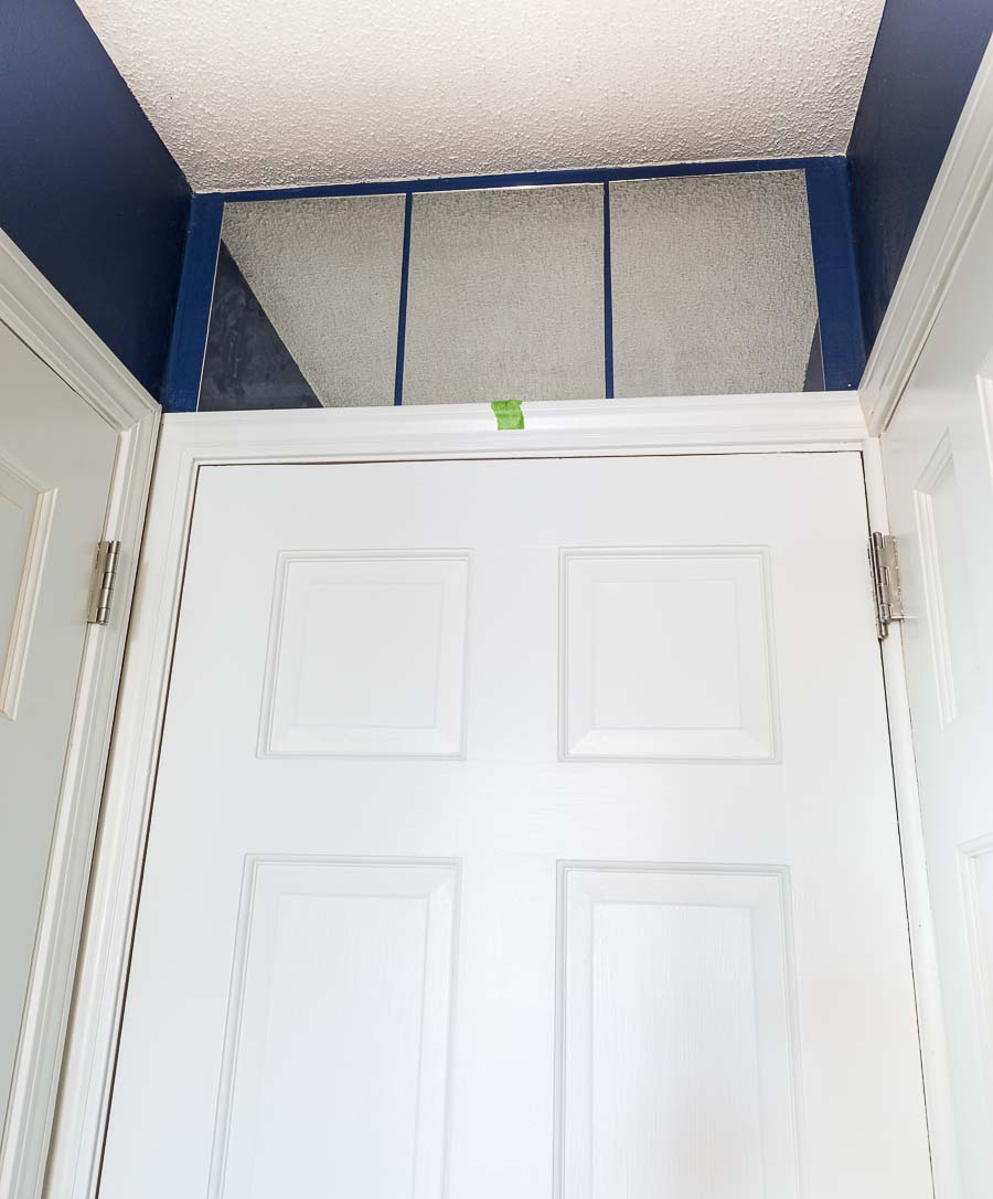 How to use mirror tiles to create a fake transom over a door