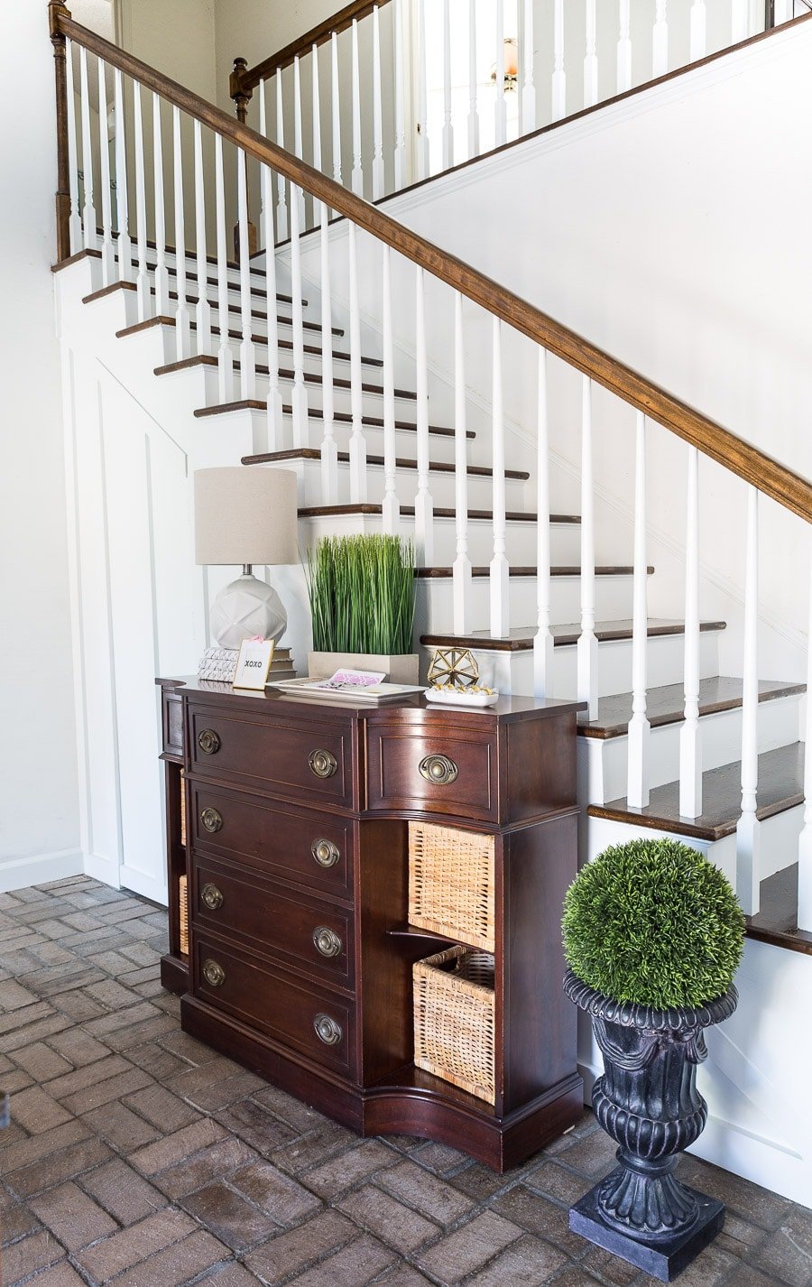 Hidden door under staircase for extra storage