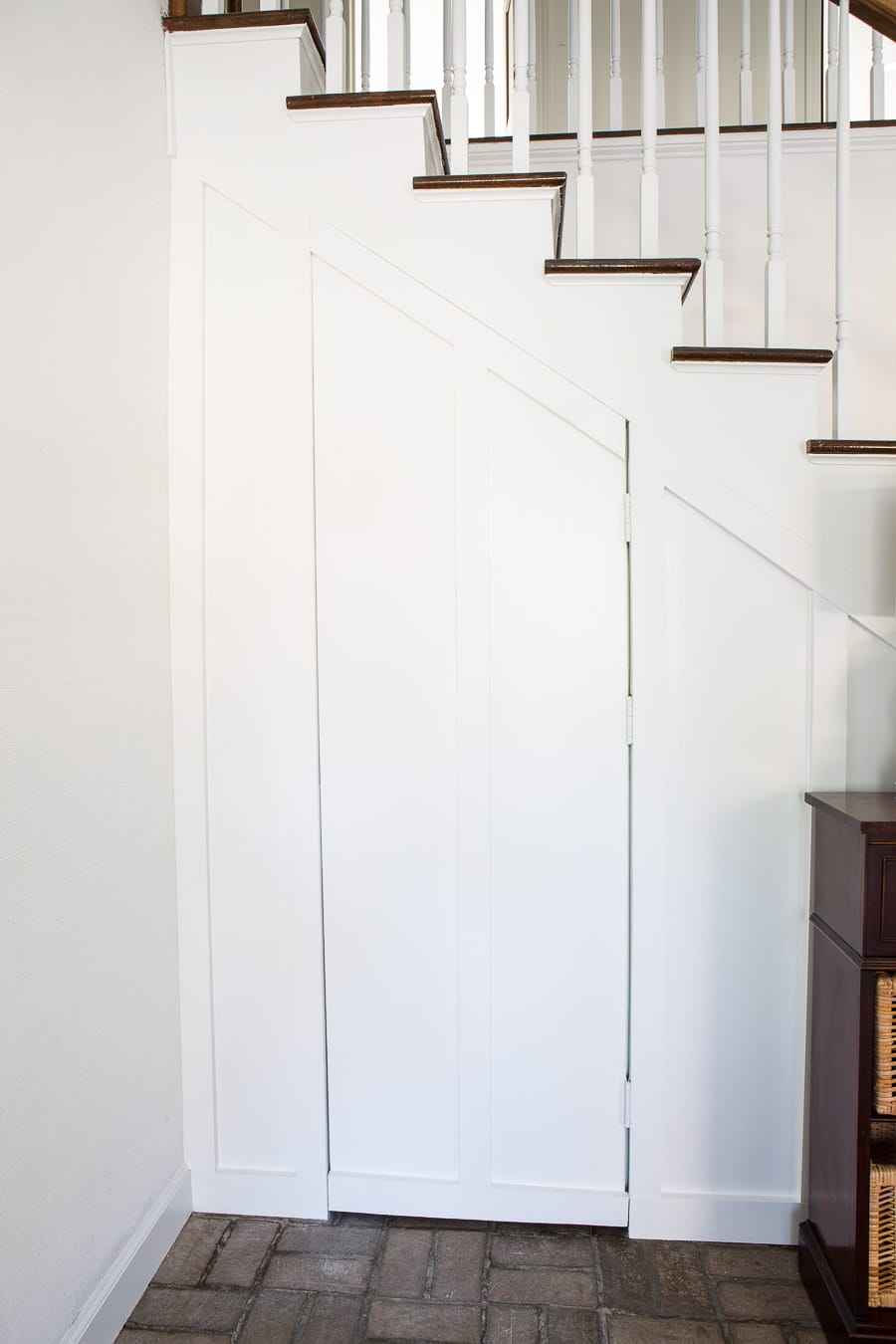 Semi-hidden door for a board and batten wall