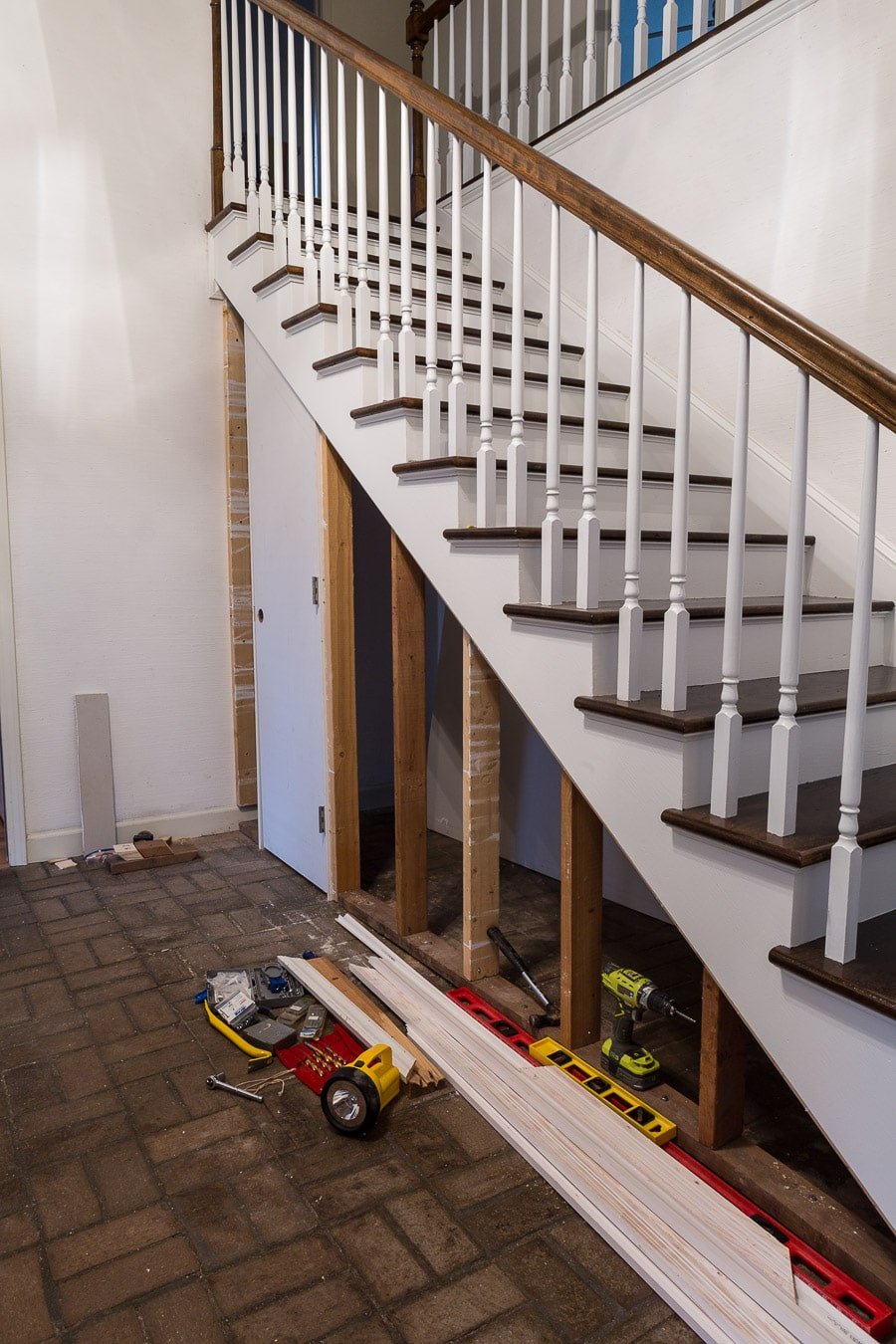 Building a closet under a staircase with a hidden door