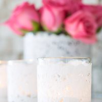 Valentine's decorating idea that can be done in 10 minutes. Make these sweet doily covered votive holders to light your home or table.