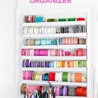 Ribbon organizer to make for a craft room wall. It is perfect for ribbon storage, but easily accessible for when needed to DIY and create.