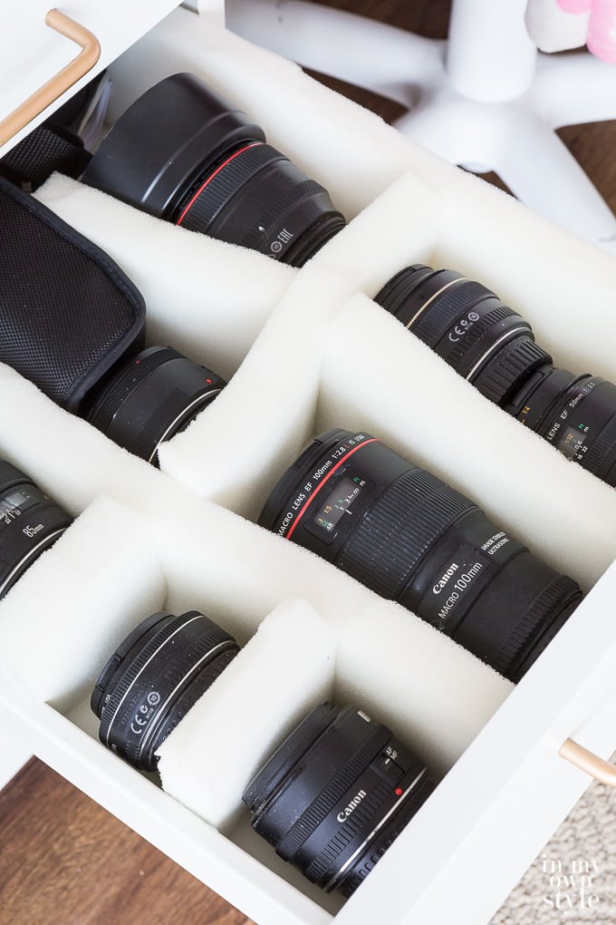 how to safely store camera lenses in a drawer.