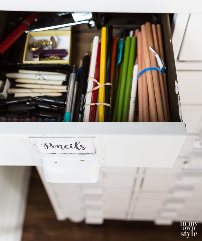 How to store and organize small items and supplies in a craft room.