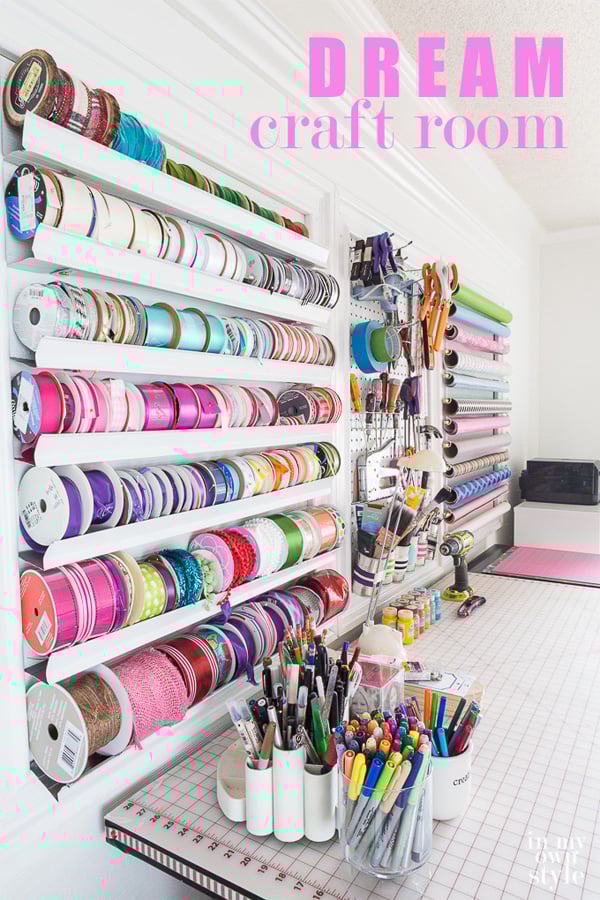 DIY made craft ribbon storage on the wall in a home craft room office.