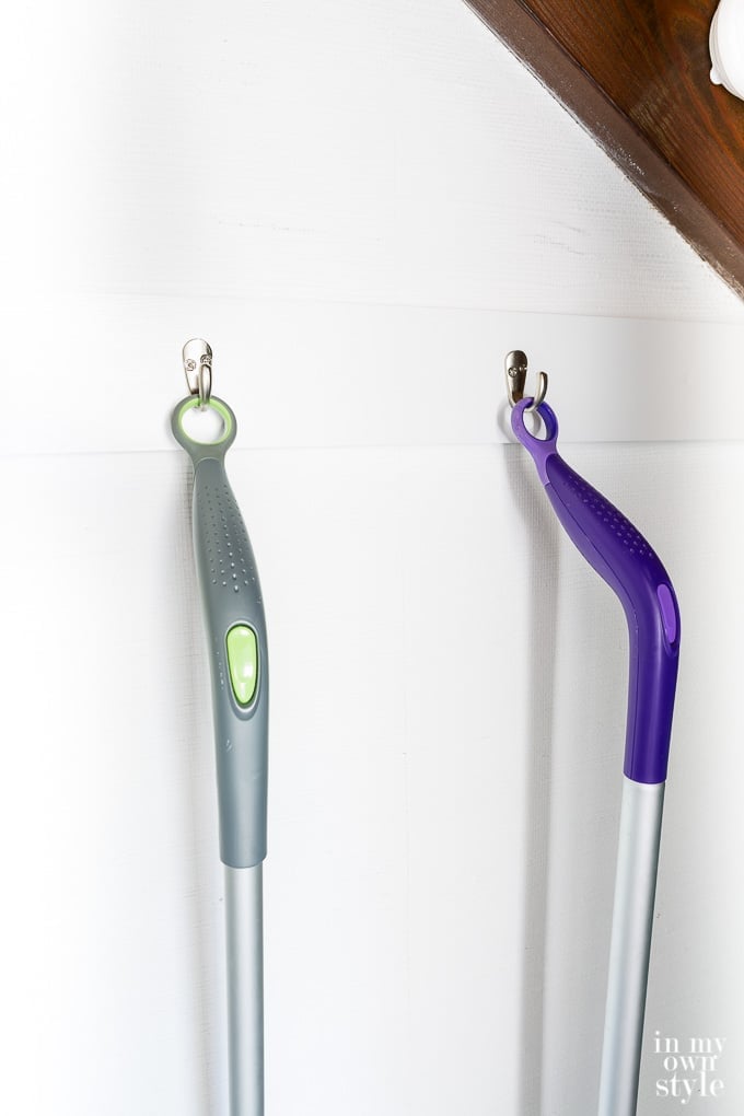 Swiffer mops in a hidden closet