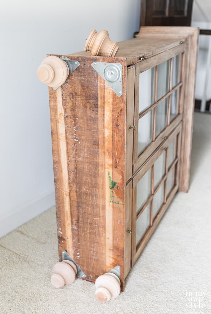 How to attach bun feet to a cabinet to transform it into a table