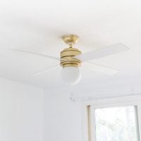 Pretty Hunter Hepburn Ceiling fan. Gold with white blades
