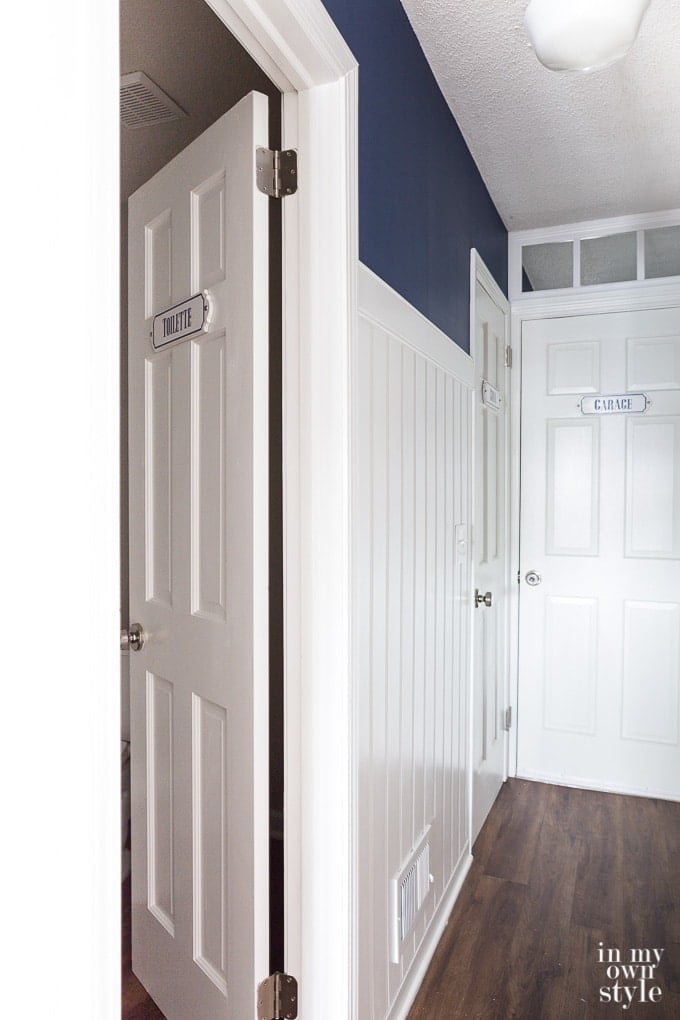 Hallway and doors where French Enameled signs will be hung
