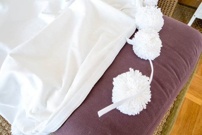 Pom-pom-trim-DIY-that-is-removable-from-slipcover