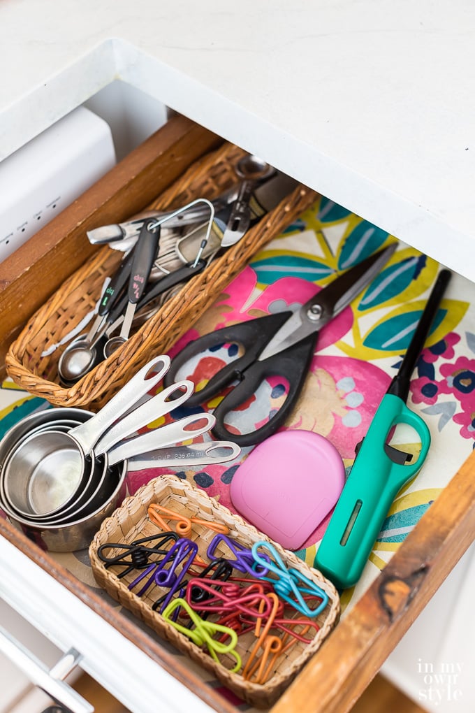 Kitchen drawer with colorful gift wrap lining