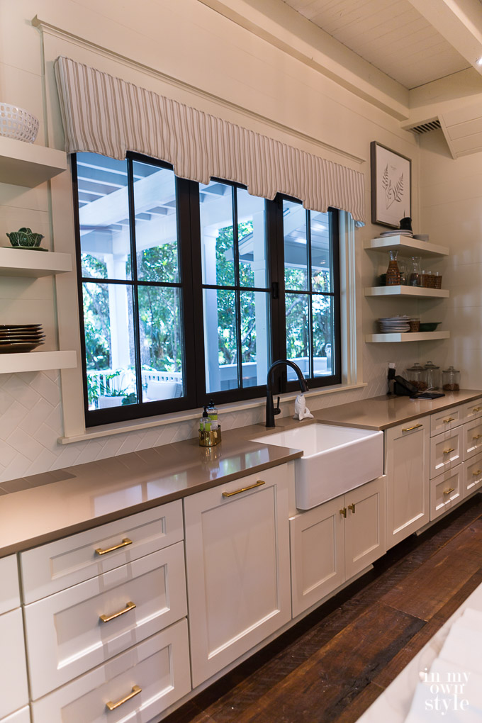 Windows that wow. This is a bi-fold kitchen window that slides open like a drive up window does. 