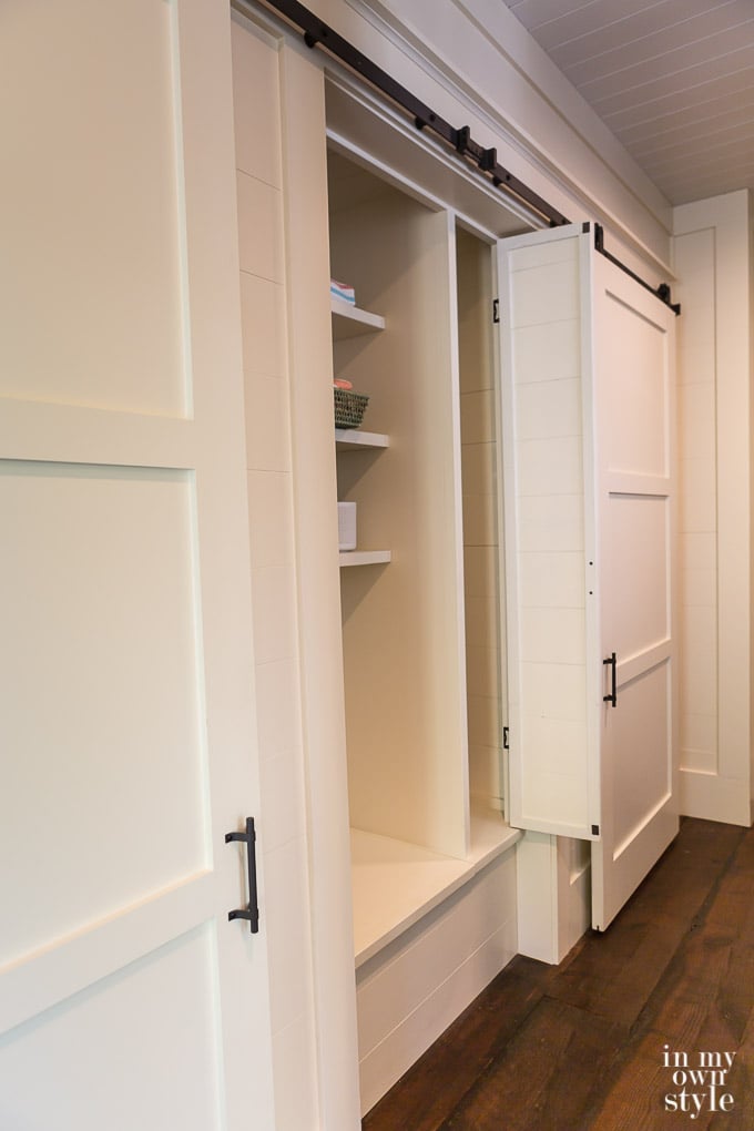 Rolling door closet in hallway of the Southern Living Idea House 2017