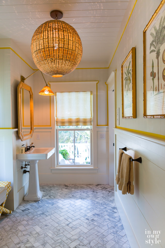 Yellow and marble bath at the Southern Living Idea house