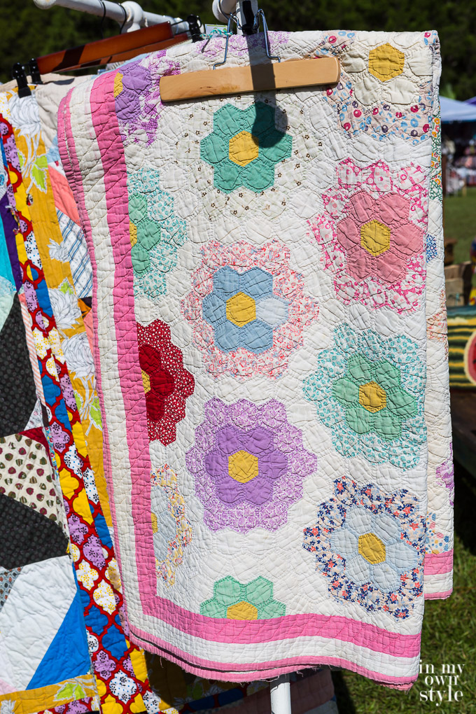 a quilt at a vendor stall at the At the French Country Flea Market