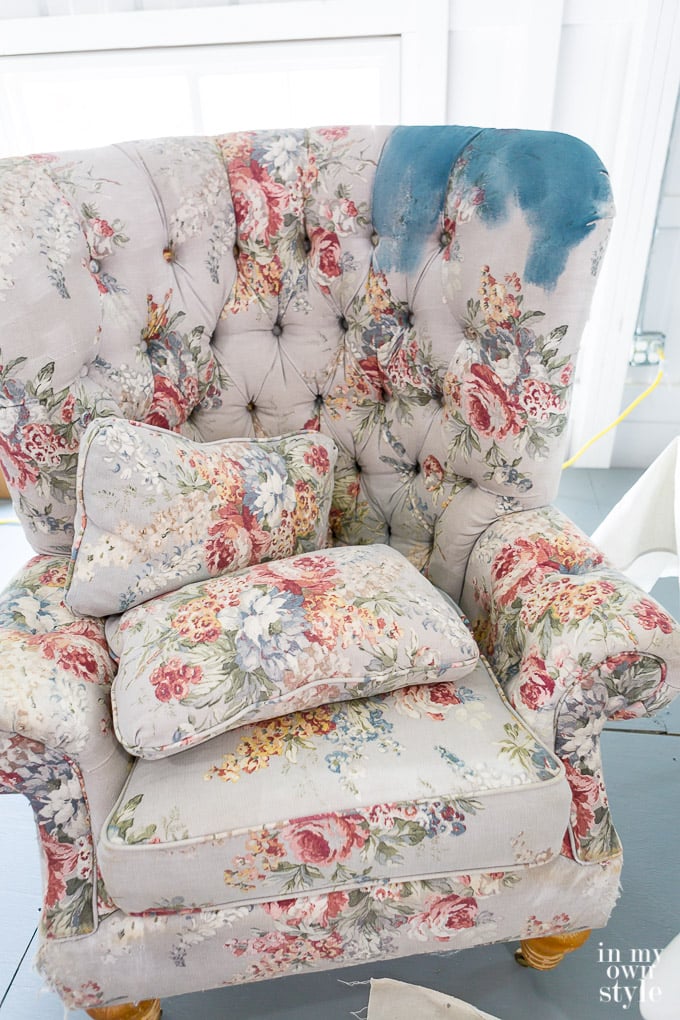 a wing chair getting painted with Annie Sloan chalk paint