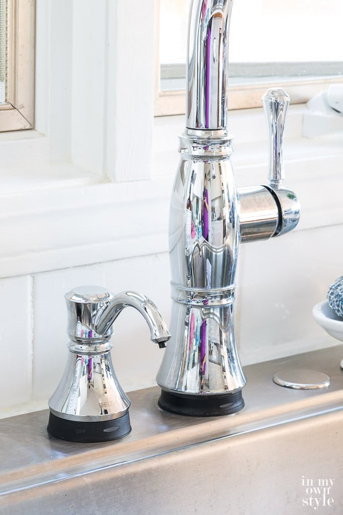 Delta-Cassidy-soap-dispenser-and-faucet-in-Chrome
