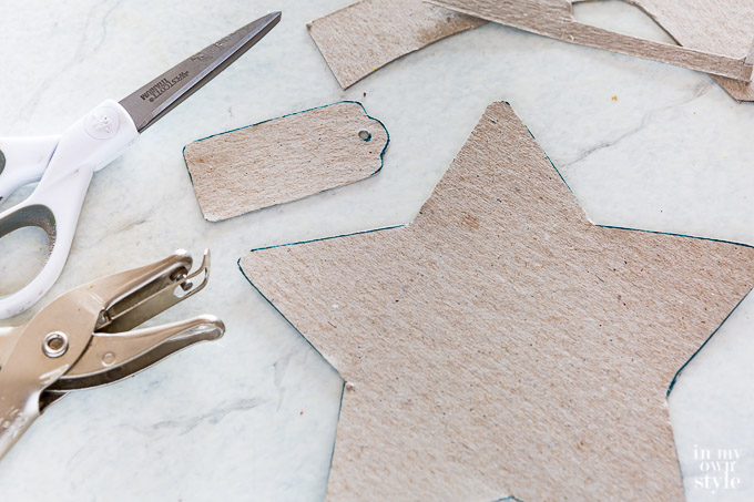 Cardboard star cut out to use as tracing pattern.