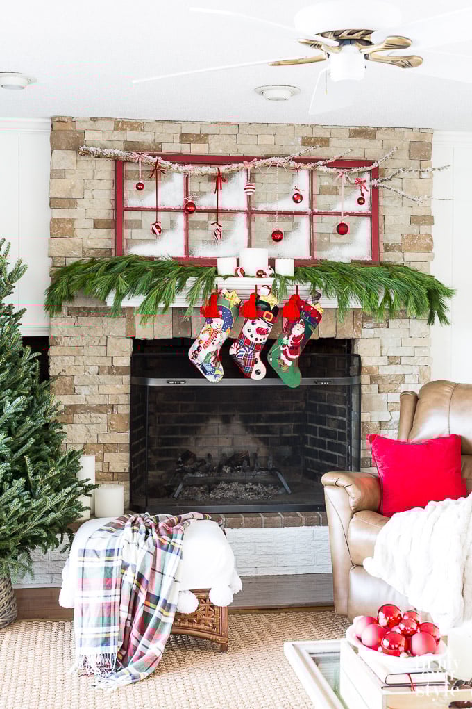 Living room holiday mantel decorating idea