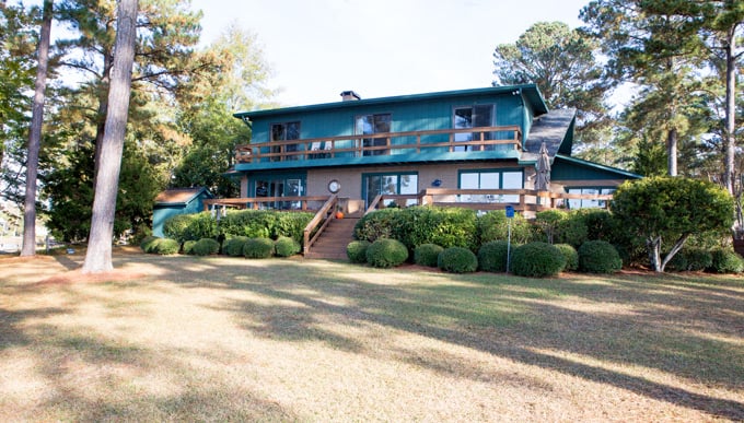 BEFORE Lake house without shutters