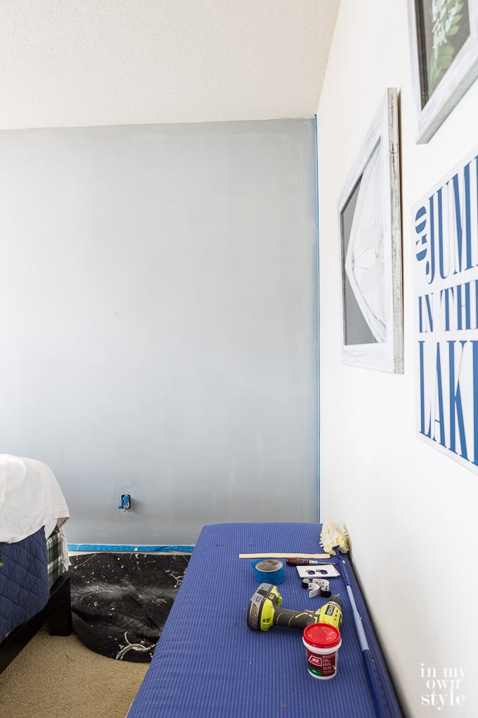 Tips on how to paint an accent wall in a room, use grey primer first.