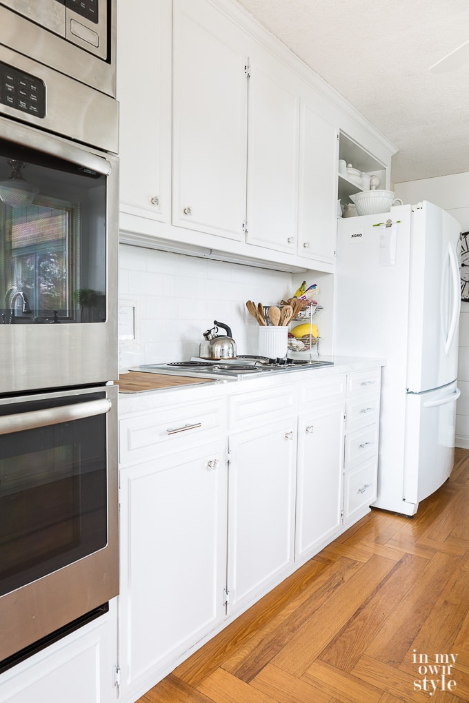 Kitchen Cabinet Organizing in an older kitchen with simple cabinets.