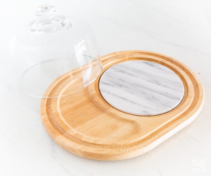 Thrift store cheese board to repurpose into a cake pedestal