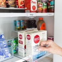Small pantry closet organizing ideas that are doable on a budget. Plus free printable labels to use to label and organize the contents of your pantry.