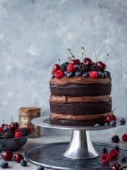 Vegan chocolate fudge cake - an easy to make, moist, fudgy vegan chocolate cake topped with coconut milk ganache. No one will be able to guess that it's vegan!