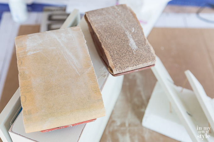 What type of sandpaper to use when distressing furniture?