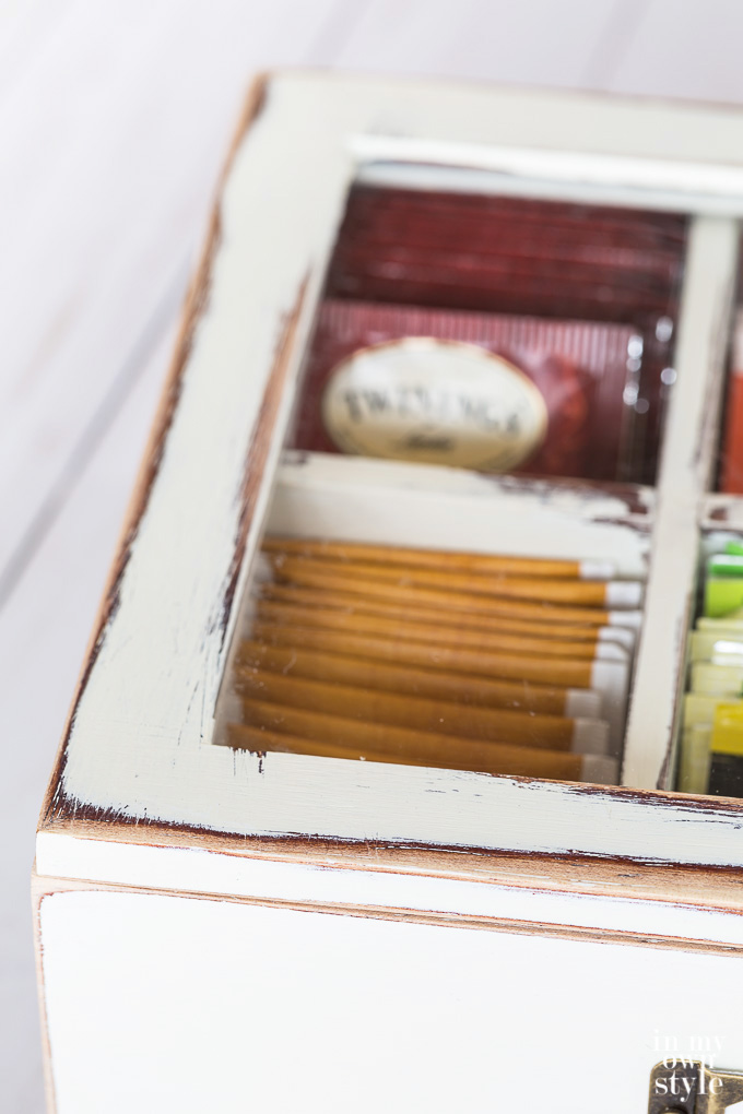 How much should I sand when distressing furniture?
