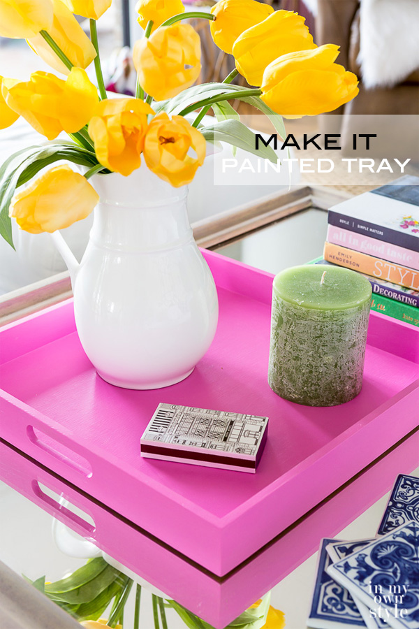 Coffee table styling idea using a tray. How to paint a tray to coordinate with a room's decor. Pink painted decorative tray.