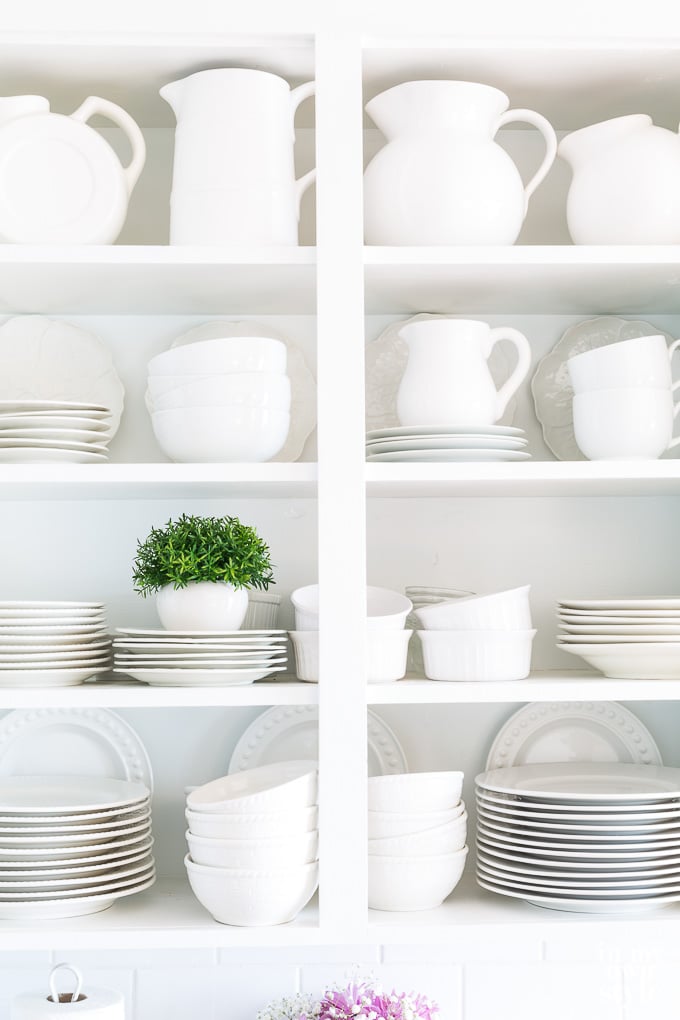 How to ideas for stying cottage kitchen open shelving. White kitchen shelves with white dishesW